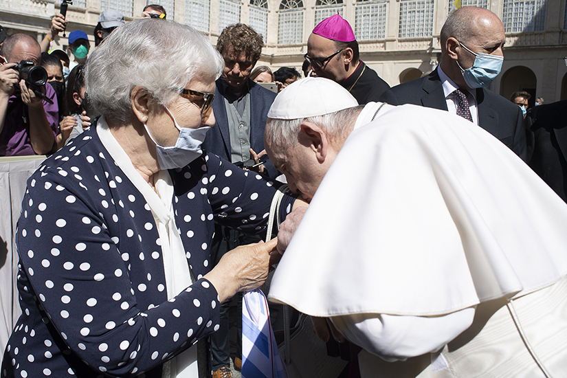 Pope Francis kissed the Nazi concentration camp number tattooed on the arm of Lidia Maksymowicz, 80, who spent three years at the Auschwitz-Birkenau camp. Pope Francis talked with Maksymowicz during his general audience in the San Damaso Courtyard of the Apostolic Palace at the Vatican May 26.