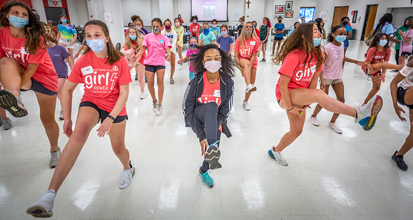 Taylor Meyer, Kynnedi Miller-Colbert and Audrey McDermott taught participants a dance at the two-day Girl POWER leadership camp held at Incarnate Word Academy on June 16.