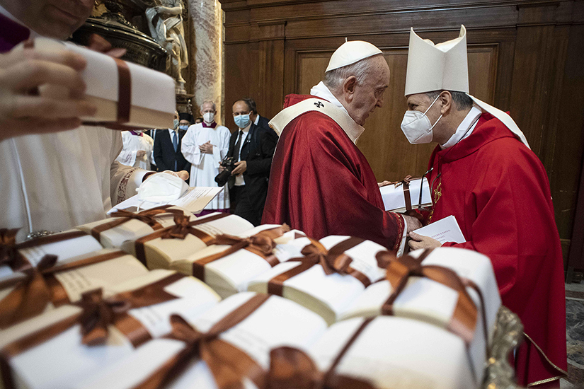 Pope Francis distributed palliums after celebrating Mass on the feast of Sts. Peter and Paul in St. Peter’s Basilica at the Vatican June 29.