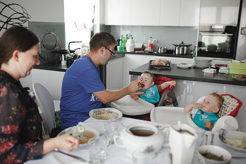 Michal and Angelika Steciak and their children, 19-month-old Peter, and 11-month-old Mary, are pictured during meal time at their home in Rembieszyce, Poland, July 11, 2021. The Steciak family was named the 2021 International Family of the Year by the Knights of Columbus during the fraternal order’s virtual convention Aug. 3-4.