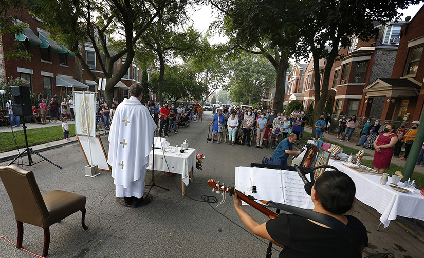 Father James Kastigar celebrated a street Mass in Chicago July 22. St. Agnes of Bohemia Catholic Church in Chicago held several street Masses in June and July in an effort to bring the Gospel message of peace and hope to city neighborhoods and pray for an end to the violence that has plagued the streets of Chicago in 2021.