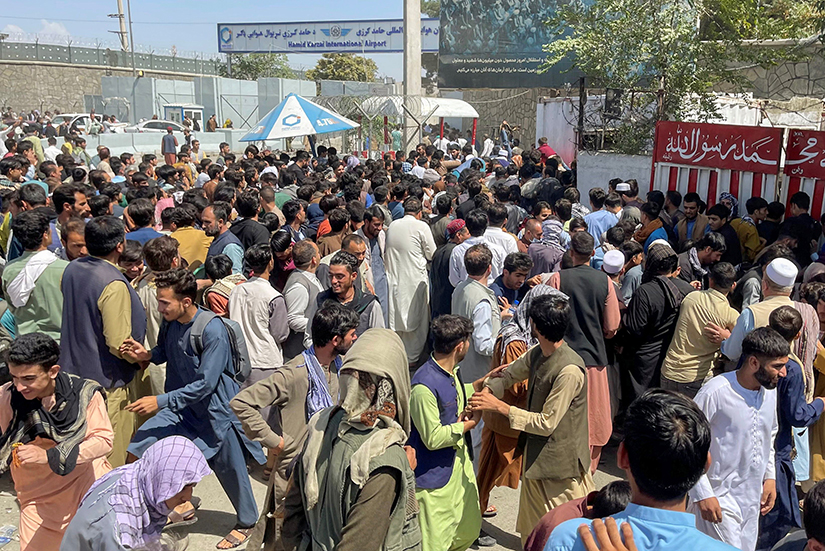People attempted to get into Hamid Karzai International Airport in Kabul, Afghanistan, Aug. 16.
