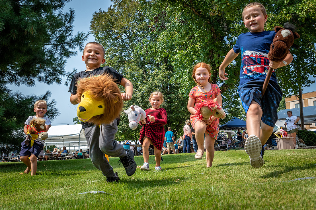 Emory Baker, Laynne Pelikan, Toni Pelikan, Libby Camper and Gavin Gibson competed in a hobby horse race at St. Joachim Parish in Old Mines at the parish festival Sept. 12.
