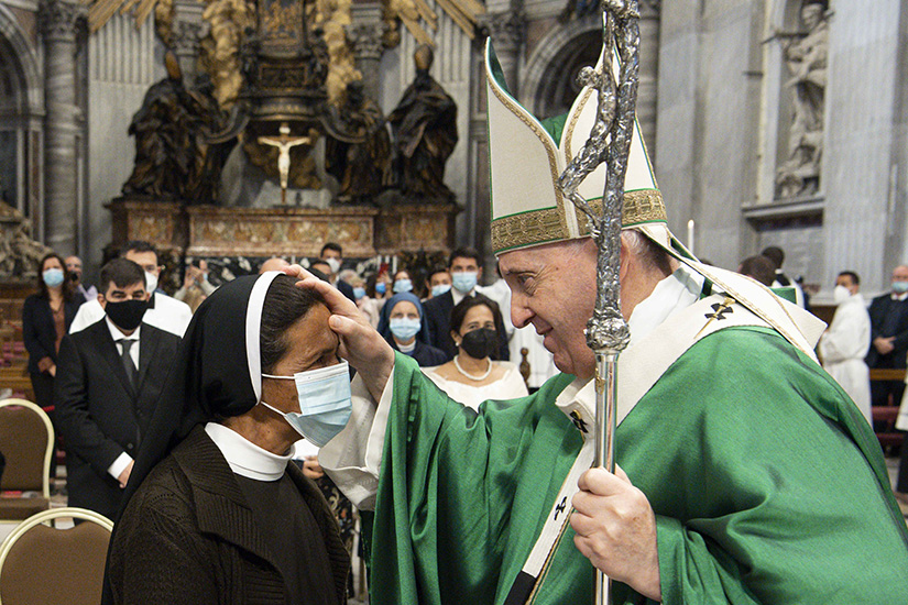 Pope Francis blessed Sister Gloria Cecilia Narváez Argot, a member of the Franciscan Sisters of Mary Immaculate, at the end of Mass in St. Peter's Basilica at the Vatican Oct. 10, 2021. The sister, a missionary from Colombia, was kidnapped in Mali in 2017 and released in early October.