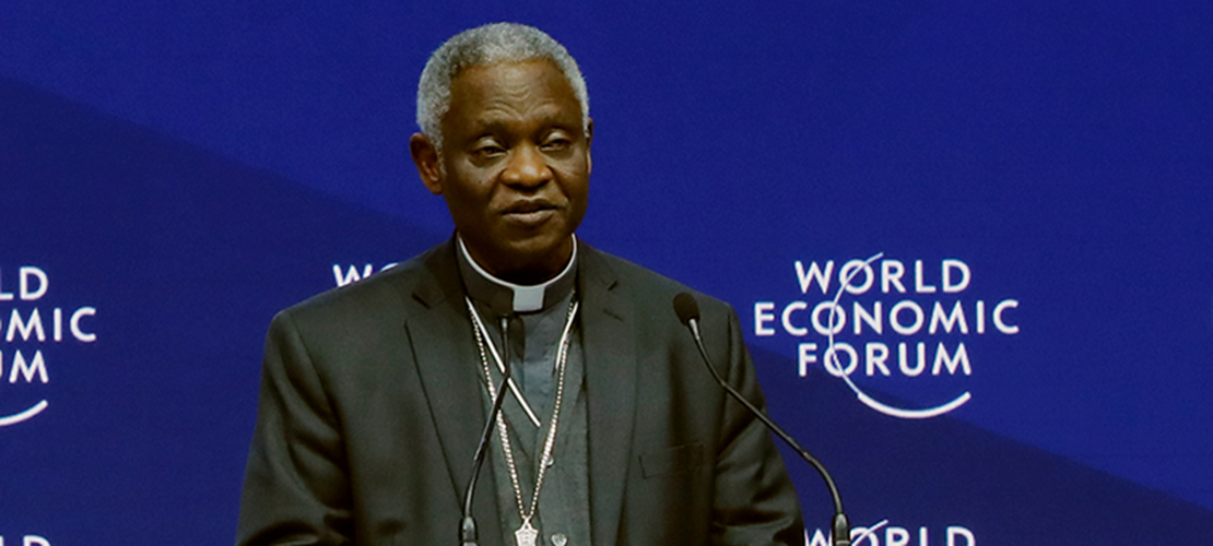 Ghanaian Cardinal Peter Turkson, prefect of the Dicastery for Promoting Integral Human Development, speaks Jan. 22 during the opening session of the World Economic Forum in Davos, Switzerland. Cardinal Turkson also spoke April 23 at the Climate Summit STL hosted by St. Louis University.