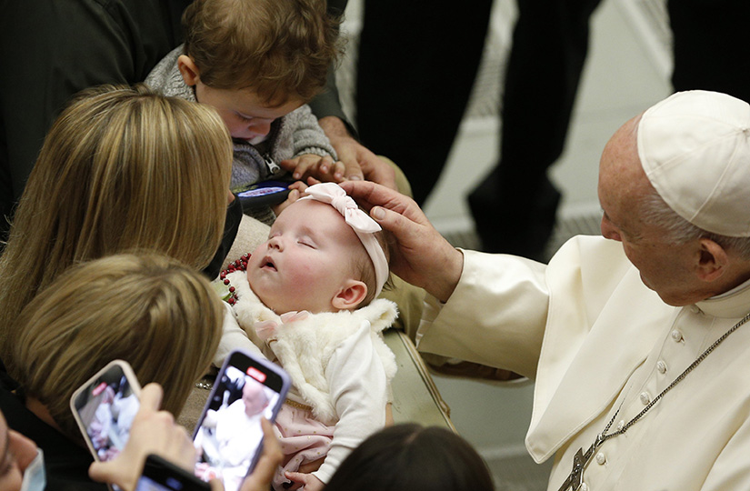 Pope Francis blessed a sleeping baby during his general audience in St. Peter’s Basilica at the Vatican Nov. 24.