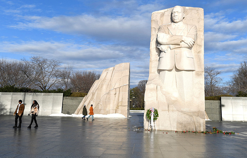 Visitors in Washington walked past the Martin Luther King Jr. Memorial Jan. 17, a federal holiday honoring the life and legacy of the slain civil rights leader.