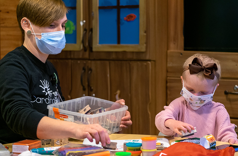 Bree Miller, an art therapist at SSM Health Cardinal Glennon Children’s Hospital, worked with 3-year-old Allie Brown in The Costas Center at the hospital in November.