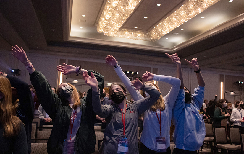 Nerinx Hall High School students Abbey Clemens, left, Jill Blanke, Kendall Barnett and Cora Venverloh danced to praise and worship music played at a Generation Life rally Jan. 21 at the Crystal Gateway Marriott in Arlington, Virginia.