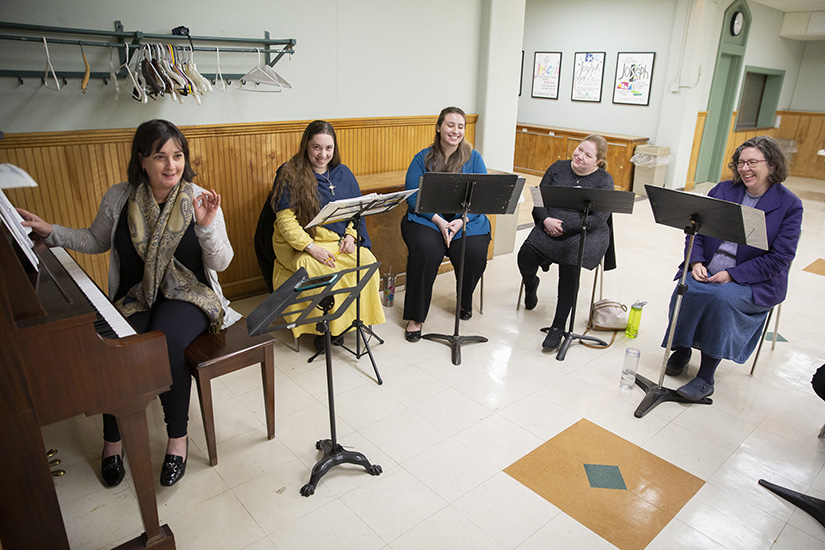 Members of Polyhymnia, an all-women’s choir, rehearsed Feb. 28 at St. Joseph Church in Clayton. Polyhymnia (“many hymns”) performs a mix of sacred music written for the liturgy, such as Gregorian chant and different Mass settings, and polyphonic pieces from the classical fine arts tradition.