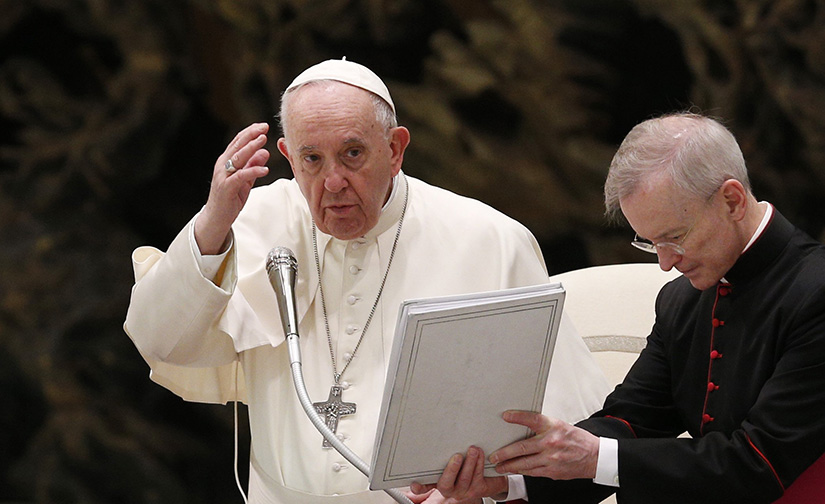 Pope Francis delivered his blessing during his general audience in the Paul VI hall at the Vatican March 23.