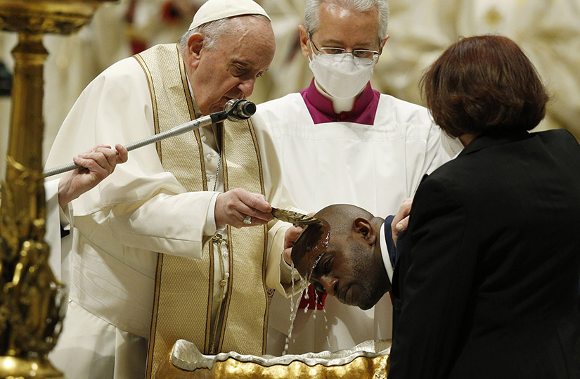 Pope Francis baptized a new member of the Church during the Easter Vigil celebrated by Cardinal Giovanni Battista Re in St. Peter’s Basilica at the Vatican April 16.