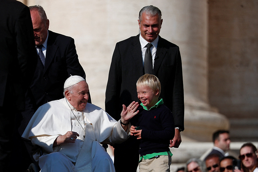 Pope Francis greeted a child during his general audience in St. Peter’s Square at the Vatican Oct. 12.
