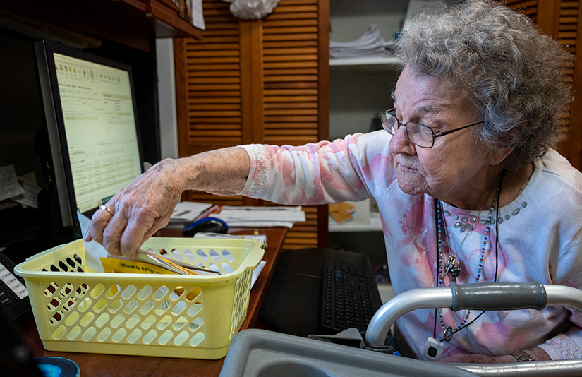 Wilma Mitchell, 95, works one day a week at St. Rose Philippine Duchesne Parish in Florissant. Mitchell has served as a parish secretary since 1970, when she was hired at the former St. Thomas the Apostle in Florissant.