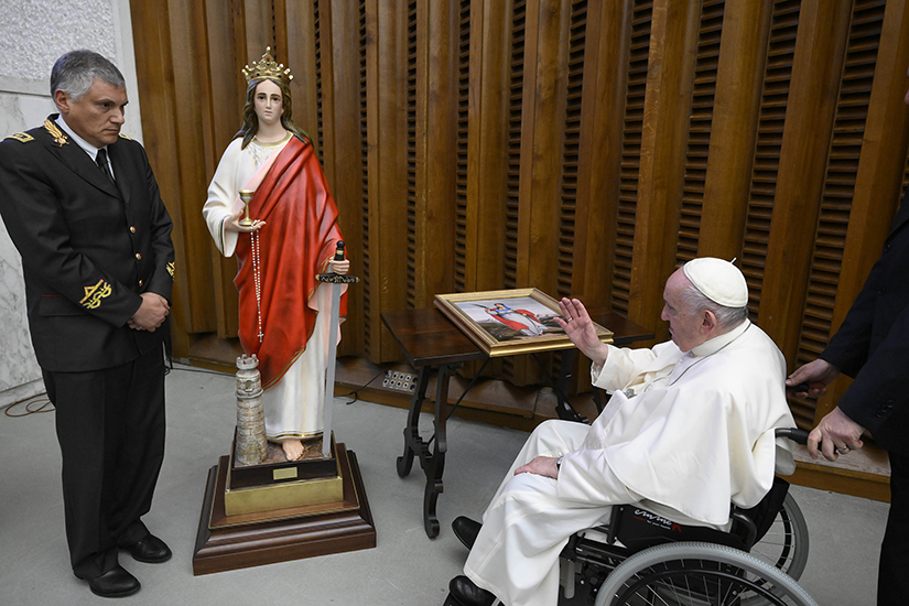 Pope Francis blessed a statue of St. Barbara, a patron saint of Italian firefighters, during an audience with hundreds of firefighters and their family members at the Vatican Dec. 10. The pope praised them as true good Samaritans, always ready to save others from calamity.
