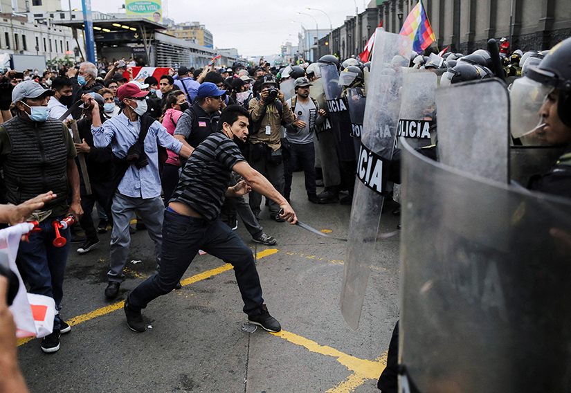Protesters and police clashed in Lima, Peru, Dec. 7 after Congress voted to oust Peruvian President Pedro Castillo. Peru’s bishops are calling for unity and urging citizens to stand up for democracy after Castillo announced he was closing Congress, and was subsequently impeached and arrested.