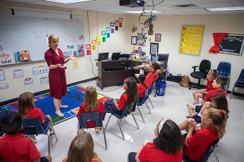 Megan Miller, a music teacher and orchestra director, taught during an Aug. 12, 2019, class session at St. Mary Catholic School in League City, Texas.