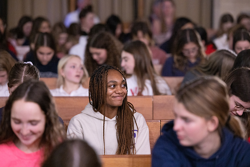 Madison Harness, a senior at Visitation Academy and president of the school’s Peace and Justice Club, smiled participated with classmates in a MLK prayer service Jan. 11 at Visitation Academy in Town and Country. Harness is one of the recipients of the Dr. Martin Luther King Jr. Model of Justice Award.