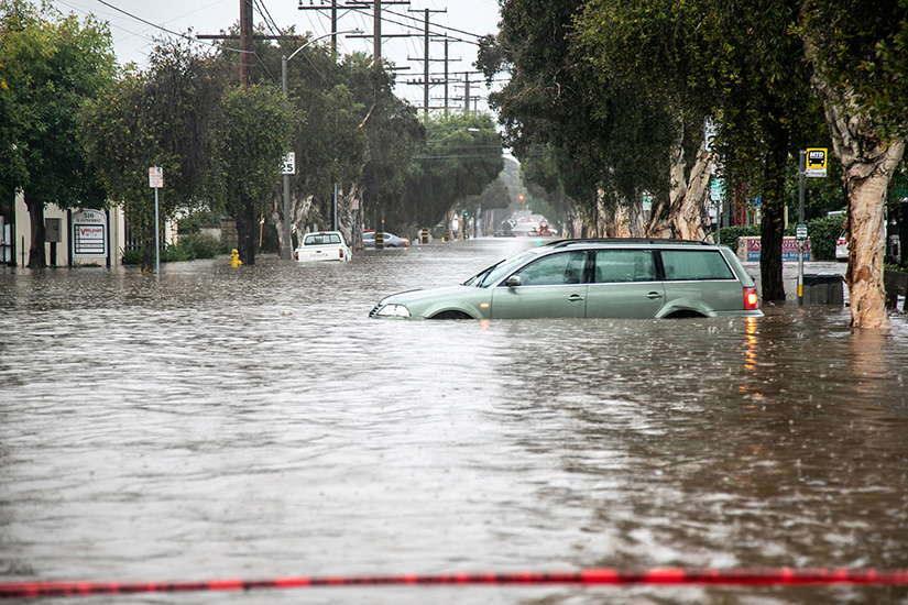 Abandoned cars are seen in a flooded street in east Santa Barbara, Calif., Jan. 9. California went from extreme drought to extreme flooding in a matter of days.