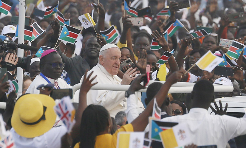 Pope Francis greeted the crowd as he arrived to celebrate Mass at the John Garang Mausoleum in Juba, South Sudan, Feb. 5.
