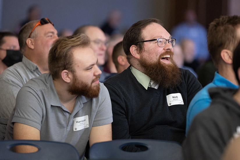 Nick Marquart, right, a parishioner at Sts. Joachim and Ann in St. Charles, and Harrison Wiswall, a parishioner at St. Peter in St. Charles, listened to Deacon James Keating speak during the Catholic Men for Christ Conference Feb. 18 at St. Louis University High School in St. Louis.