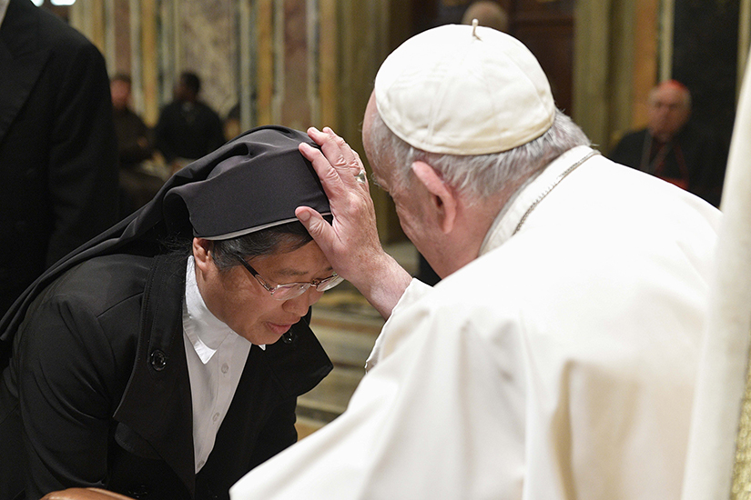 Pope Francis blessed a nun at an audience at the Vatican in November. “Monks and nuns are the beating heart of the proclamation,” Pope Francis said of contemplative religious, adding, “their prayer is oxygen for all the members of the body of Christ.”