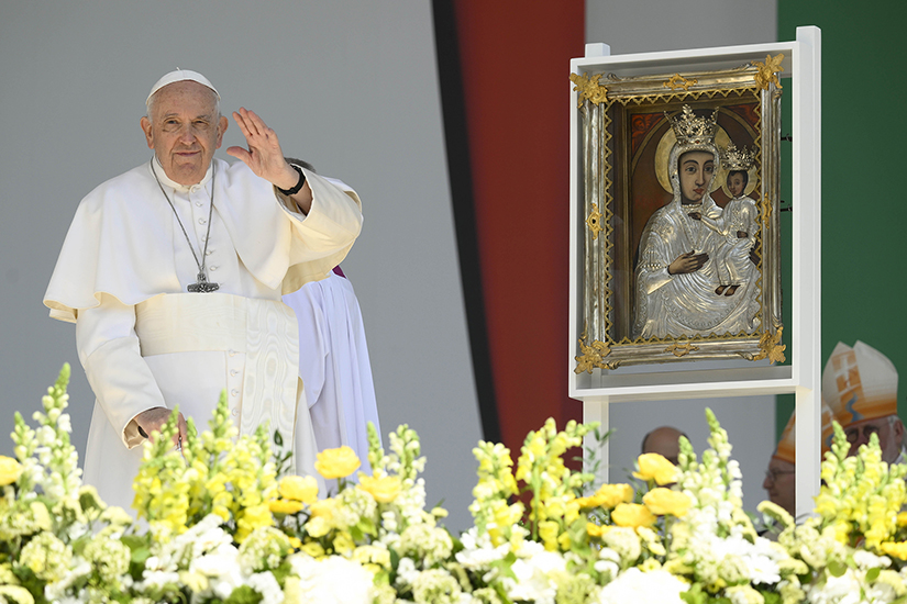 Pope Francis waved to the crowd after praying before an 18th-century copy of a famous Marian icon, right, following his celebration of Mass in Budapest’s Kossuth Lajos Square April 30.