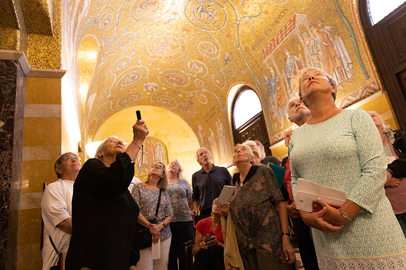 Docent Dee Vitt, left, led a tour of the Cathedral Basilica of Saint Louis May 17 for descendants of William Theodore Diebels, the cathedral’s first music director and organist from 1915-39.