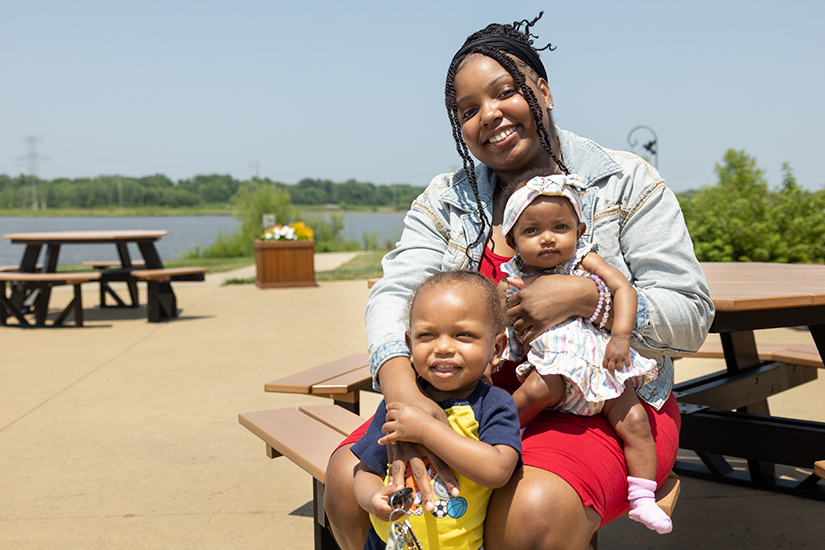 Birthright St. Charles client Alesha Williams posed for a portrait with her children Keenan, 1, and Samora, 4 months, on June 20 at 370 Lakeside Park in St. Peters.