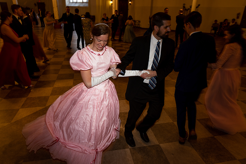 Lauren Prize of St. Francis de Sales wore her pink handmade gown while dancing English country dance May 20 at St. Francis de Sales Oratory in St. Louis. The dance was hosted by the Sursum Corda young adult group at the oratory. The decorum of English country dance “reflects the order of God,” Prize said.