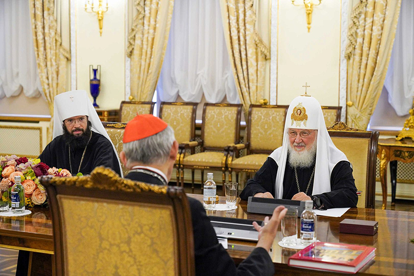 Cardinal Matteo Zuppi, on a peace mission to Moscow on Pope Francis’ behalf, spoke with Russian Orthodox Patriarch Kirill of Moscow, right, and Russian Orthodox Metropolitan Anthony of Volokolamsk, head of external Church relations for the Moscow Patriarchate, left, during a meeting at the patriarch’s residence at the Danilov monastery in Moscow June 29.