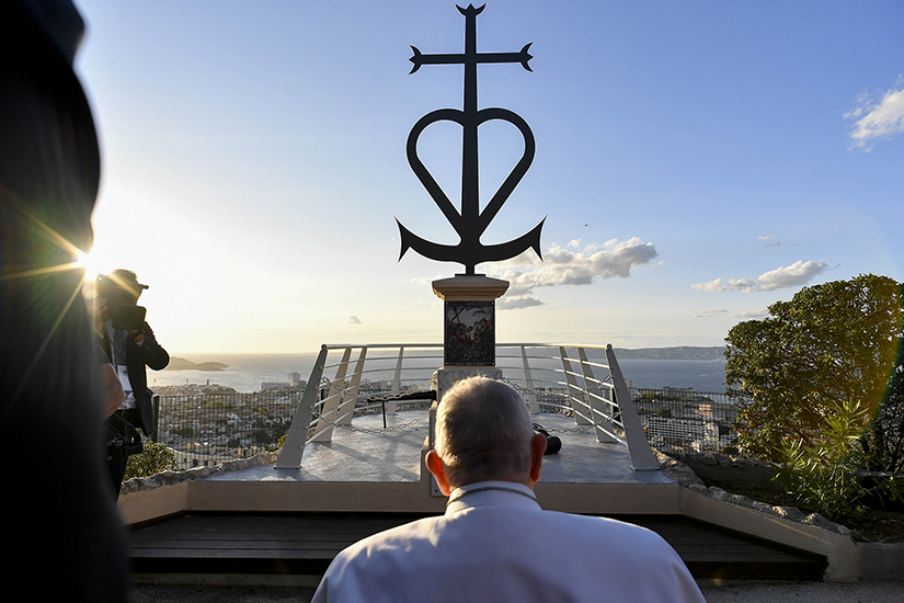 Pope Francis paused Sept. 22 at a memorial in Marseille, France, dedicated to sailors and migrants lost in the Mediterranean Sea.