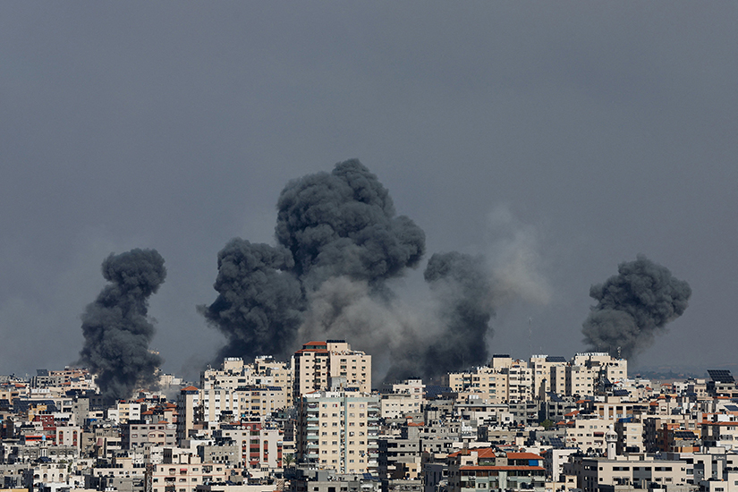 Smoke rose following Israeli strikes in Gaza Oct. 7. The strikes were in retaliation after Hamas breached Israeli security along the Gaza border at dawn and entered border communities amid a barrage of over 2,000 rockets that reached into Jerusalem and Tel Aviv.