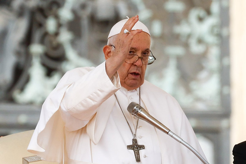 Pope Francis gave a blessing at the end of his weekly general audience in St. Peter’s Square at the Vatican Oct. 18.