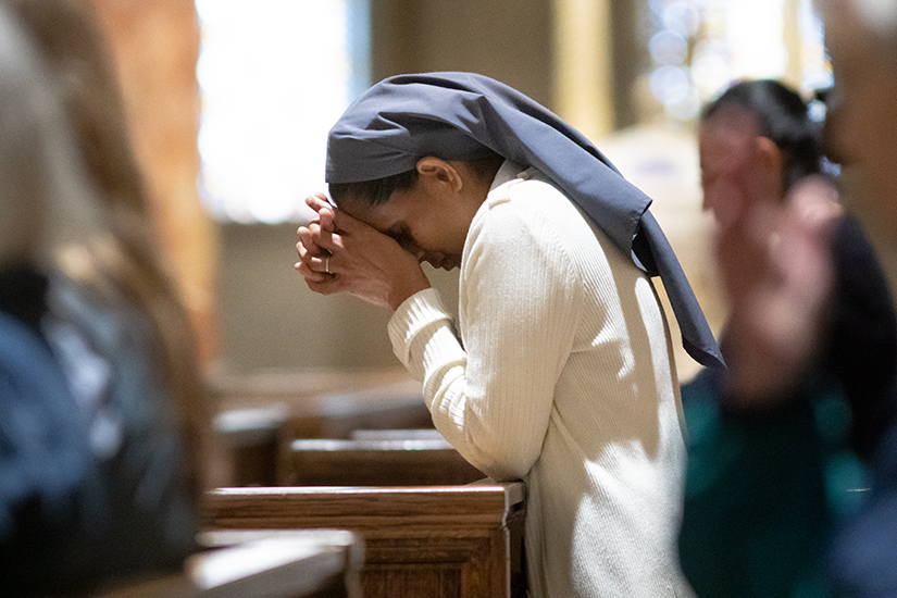 Sister Jolly Joseph of the Salesian Missionaries of Mary Immaculate prayed during a Rosary service Oct. 27 at the Cathedral Basilica of Saint Louis. Pope Francis called for a day of prayer, fasting and penance for peace in the world, particularly in the Middle East.