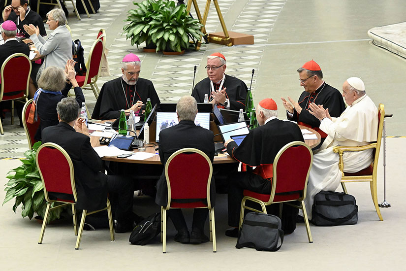 Pope Francis and leaders of the assembly of the Synod of Bishops applauded at the conclusion of the gathering’s last working session Oct. 28 in the Paul VI Hall at the Vatican.