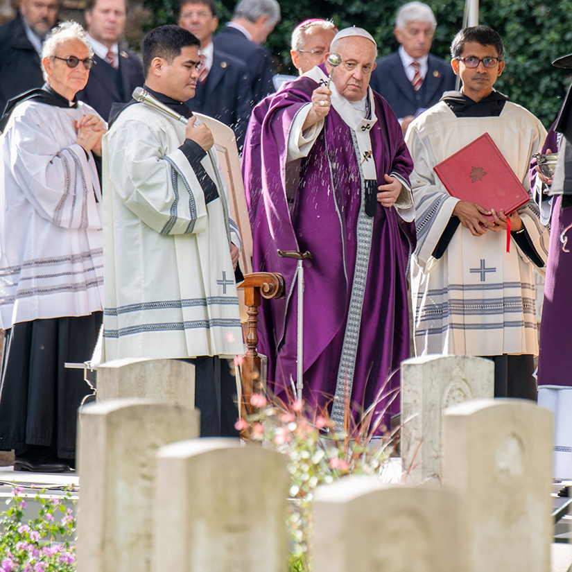 Pope Francis blessed graves with holy water at the end of Mass for All Souls Day at the Rome War Cemetery, the burial place of members of the military forces of the Commonwealth in Rome.