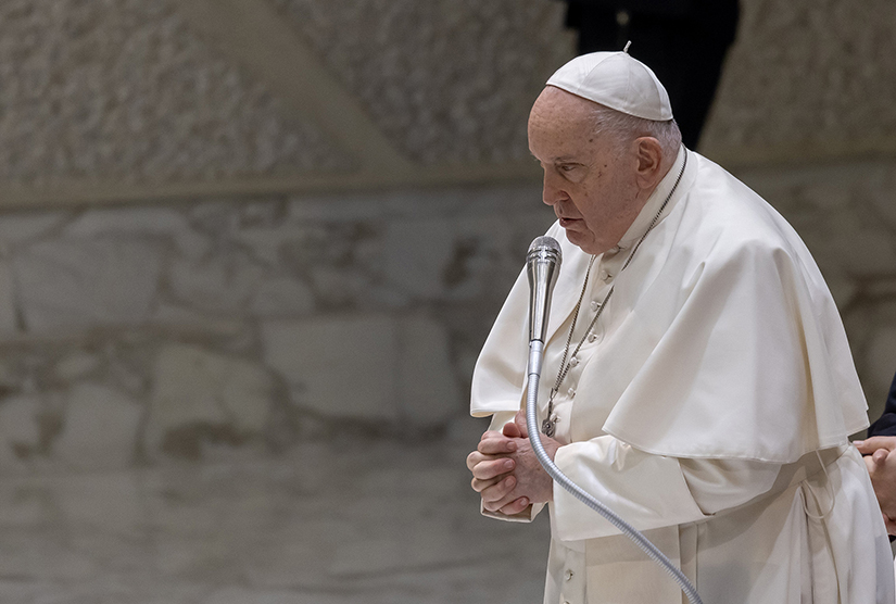 Pope Francis prayed at his weekly general audience in the Vatican’s Paul VI Audience Hall Nov. 29. At the beginning of the audience, he explained he still was suffering from the flu and so would have an aide read his catechesis.