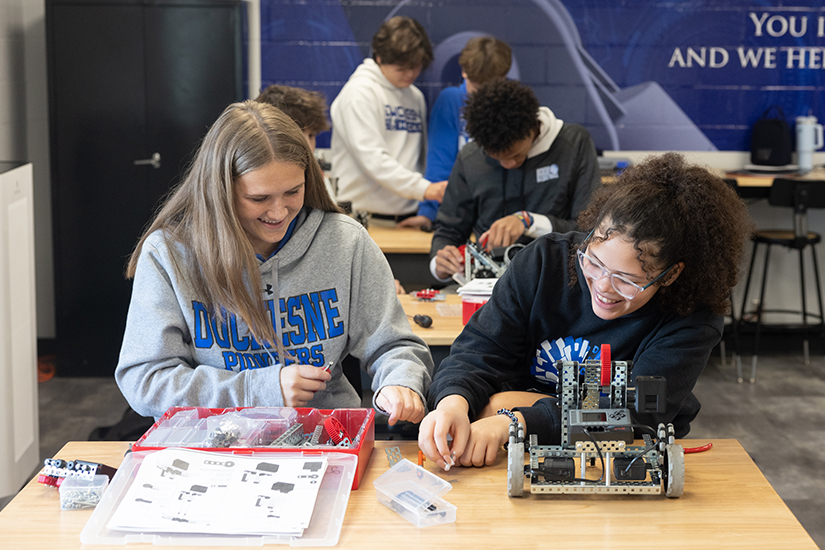 Duchesne High School juniors Ally Ledbetter and Apparynciya Duncan talked while working together in a robotics class Dec. 4 at the high school in St. Charles. Duchesne High School raised more than $260,000 through the #iGiveCatholic campaign on Giving Tuesday.