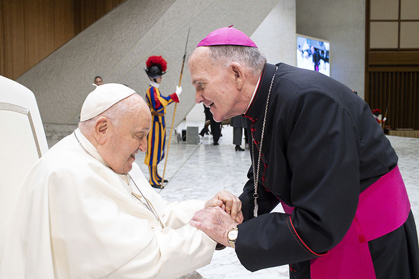 Pope Francis greets Bishop David M. O’Connell of Trenton, New Jersey, after his weekly general audience in the Paul VI Audience Hall at the Vatican Jan. 10. Bishop O’Connell suffered a heart attack Jan. 4 in Rome and was released from the hospital Jan. 9.