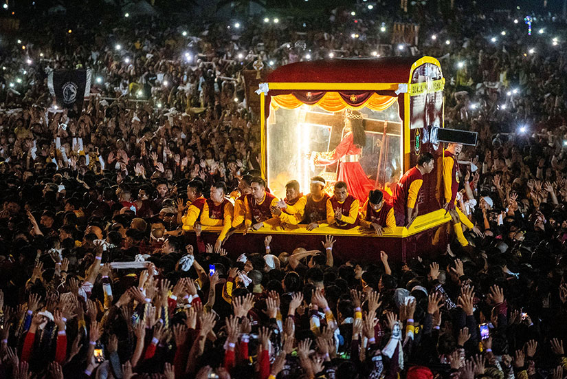Pilgrims joined the procession of the Black Nazarene during its feast day in Manila, Philippines, Jan. 9. The wooden statue, carved in Mexico and brought to the Philippine capital early in the 17th century, is cherished by Catholics, who believe that touching it can lead to a miracle. This was the first large procession with the statue since 2020.