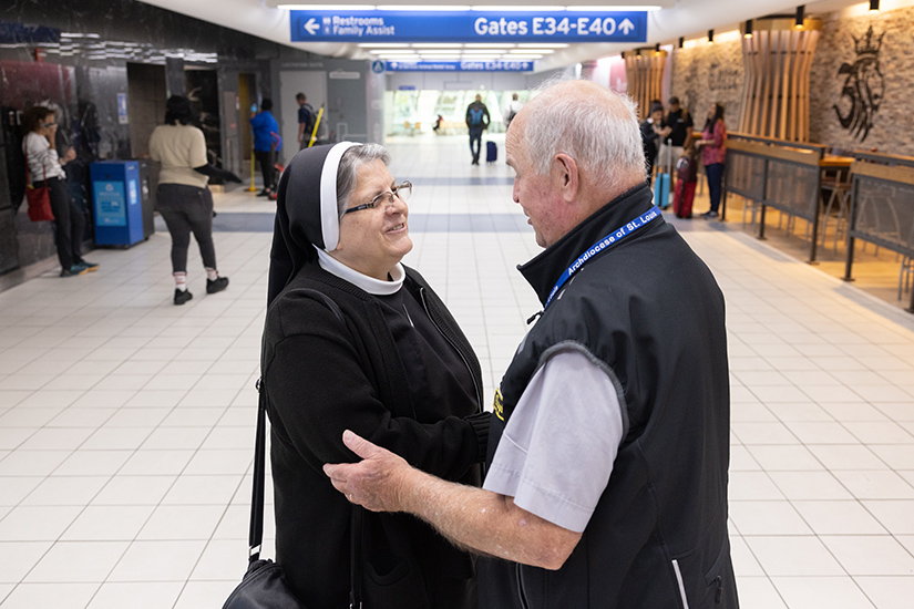 Deacon Jim Martin, a chaplain at St. Louis Lambert International Airport, chatted with Sister Mariette Moan, ASCJ, who was in town from Connecticut to attend a conference, in Terminal 2 of the airport in September.