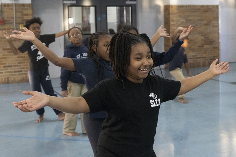 St. Louis Catholic Academy third-grader Jakiya Durham danced during an after-school program featuring West African drumming and dancing Jan. 17 at the school, located in the Penrose neighborhood of north St. Louis. The lessons help build student confidence and contribute to improved concentration in the classroom, said Chinaza Uwizéyé, who leads the lessons.