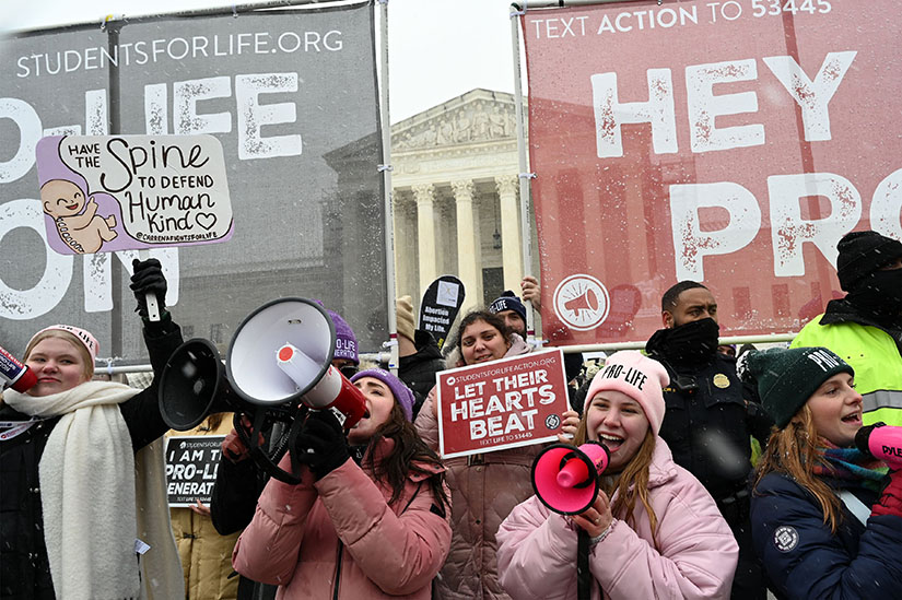 Pro-life demonstrators rally outside the U.S. Supreme Court during the 51st annual March for Life in Washington Jan. 19. The march’s theme was “With every woman, for every child.”