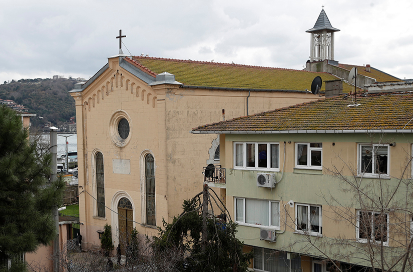 The bell tower of the Italian Santa Maria Catholic Church in Istanbul, Turkey, is pictured after two masked gunmen attacked the church during Sunday morning Mass Jan. 28, leaving at least one worshipper dead.
