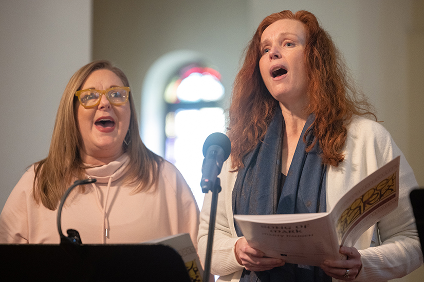 Nicky Collett, a parishioner at St. Gerard Majella in Kirkwood, and Julie Hickey, a parishioner at St. Joseph in Clayton, both portrayed Woman #2 during a rehearsal for “The Song of Mark” on Feb. 3 at Christ the King Church in University City. “The Song of Mark” is a musical by Marty Haugen based on Jesus’ public ministry and His resurrection story, as recounted in Mark’s Gospel.