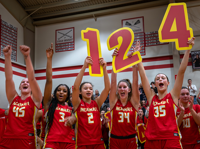 Players from Incarnate Word Academy, including, from left, Sophia Otten, Zoe Best, Nevaeh Caffey, Kaylynn Janes and Abbie Sextro celebrated after beating Ursuline Academy 75-32, setting a new Missouri state record with 124 consecutive victories at Ursuline. 