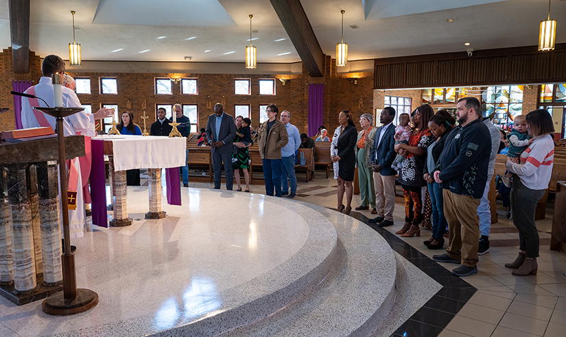 Catechumens and candidates gathered during the Rite of the Second Scrutiny during Mass on March 10 at St. Norbert Church in Florissant. Ten people at St. Norbert anticipate joining the Church at Easter.