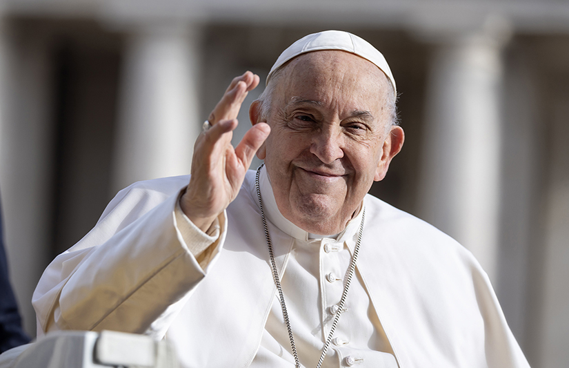 Pope Francis waved as he rode in the popemobile around St. Peter’s Square at the Vatican before his weekly general audience April 10.