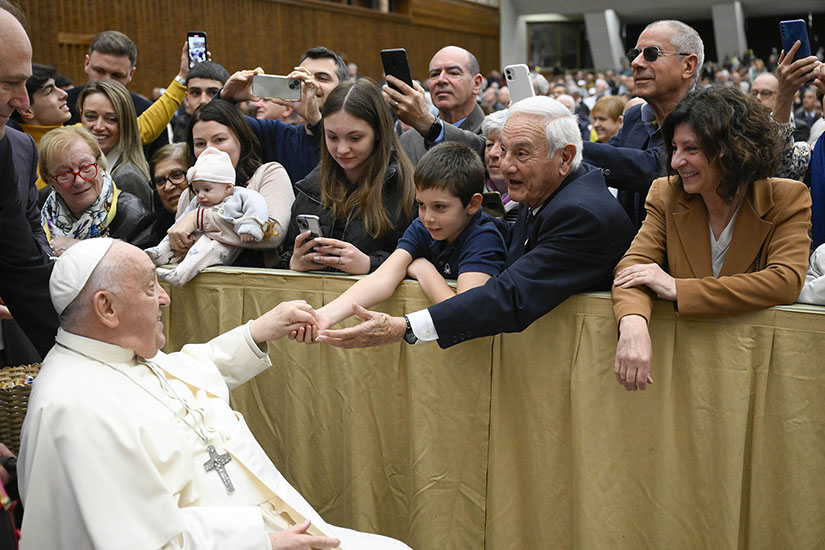 Pope Francis greeted Italian grandparents with their children and grandchildren April 27 in the Paul VI Audience Hall at the Vatican.